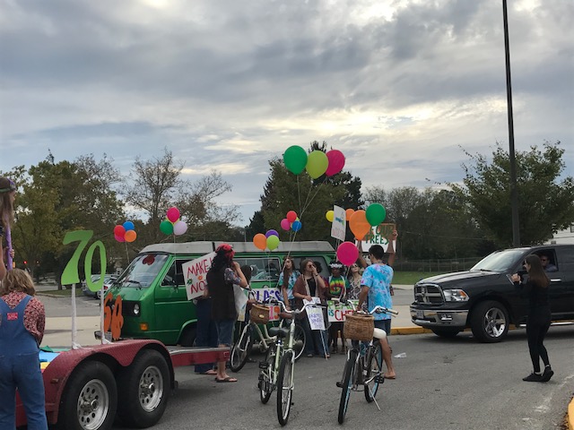 The+Junior+Class+participates+in+the+Homecoming+Parade.+Their+1970%27s+themed+float+was+a+great+addition+to+the+theme+%27Through+the+Decades%27.