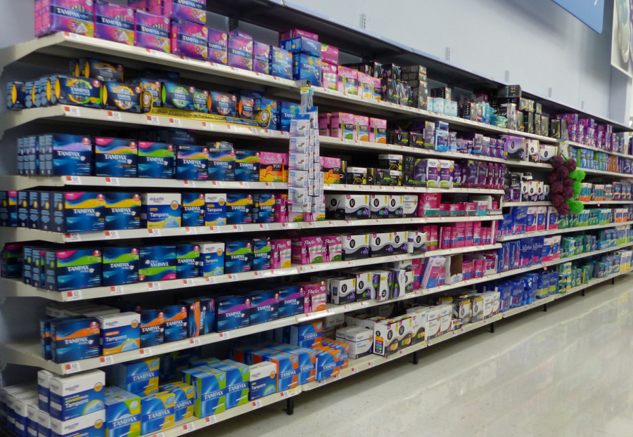 An assortment of feminine products at Walmart. The average woman spends over a thousand dollars every year on these products.