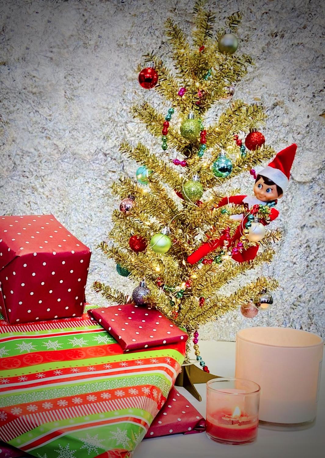 Festive elf on a tree