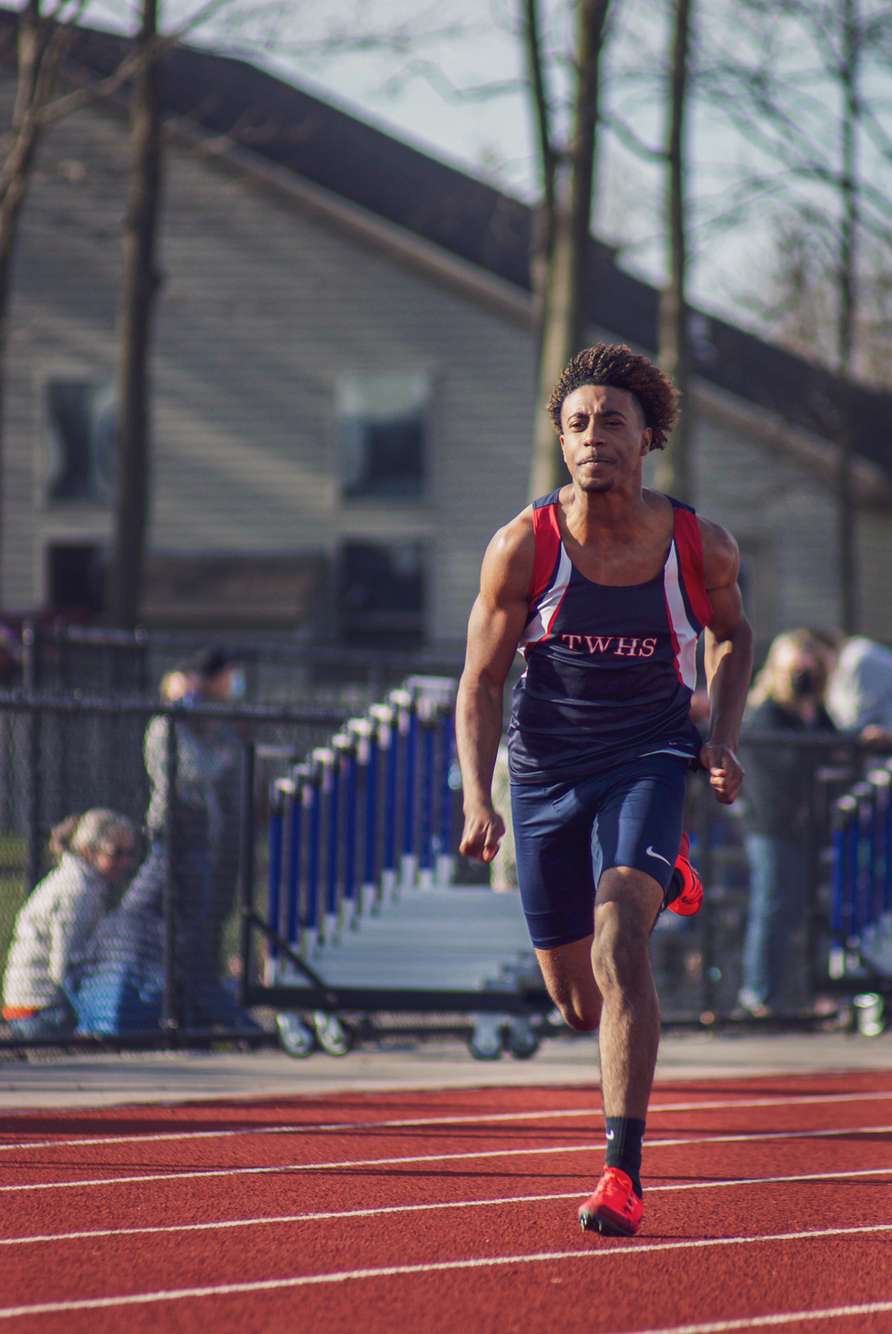 Jeremiah Smith runs the 200m dash at Marysville during the Spring 2021 season.