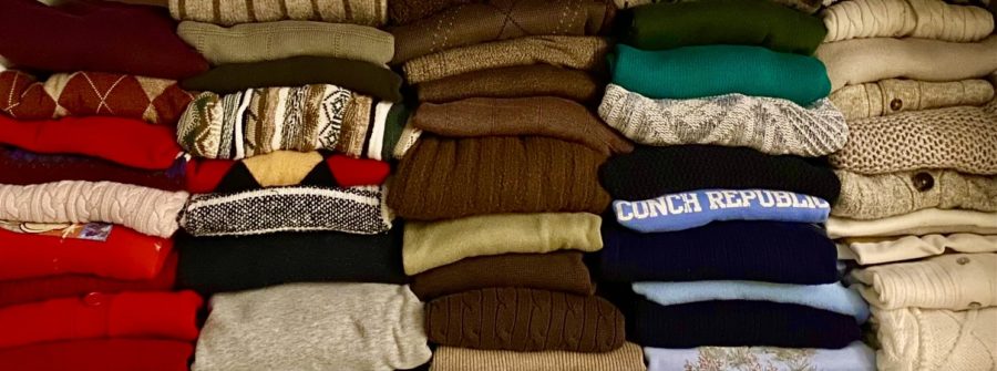 A+stack+of+thrifted+sweaters+originating+from+across+Columbus.+This+is+a+curated+collection+accrued+over+one+year.+They+are+a+trendy+winter+closet+staple.