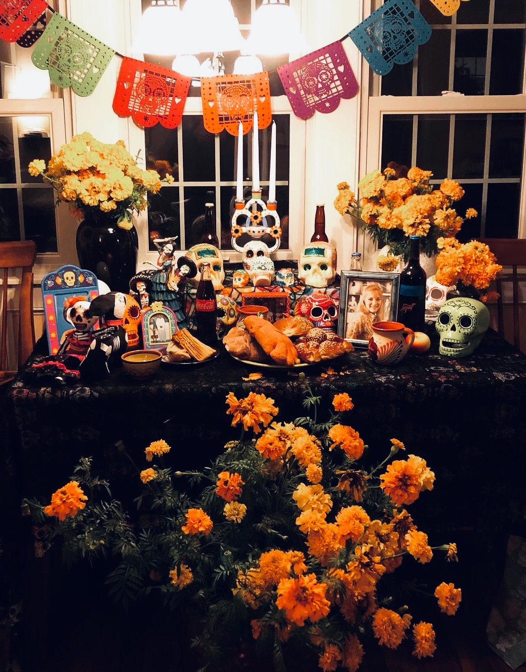 An ofrenda, an annual tradition at the center of Dia de los Muertos. This ofrenda was assembled in the house of English teacher Emma Ruiz. Her family celebrates Dia de los Muertos annually. 