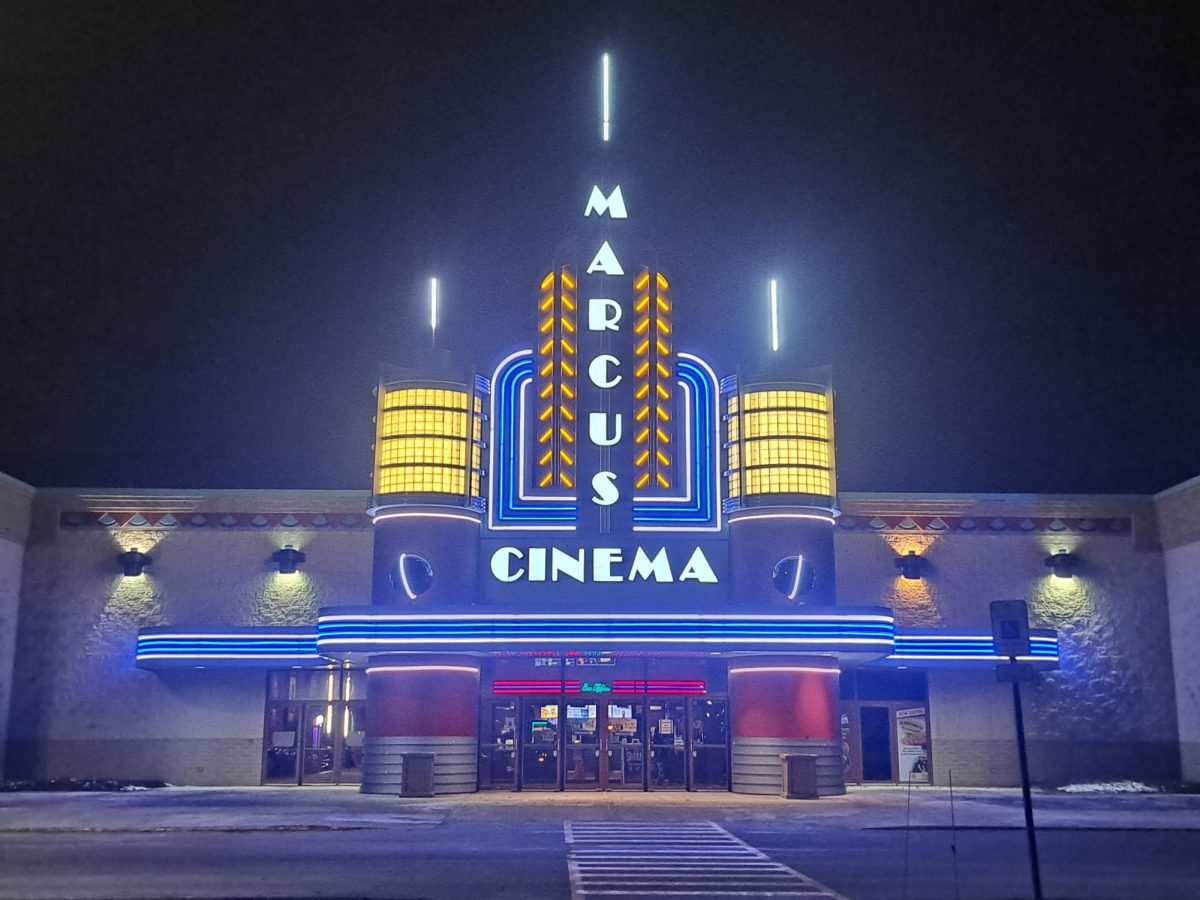 Front of Marcus Cinema with the lights brightly shining