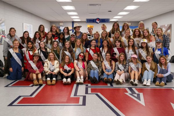 Participating senior girls pose for a group picture on Halloween