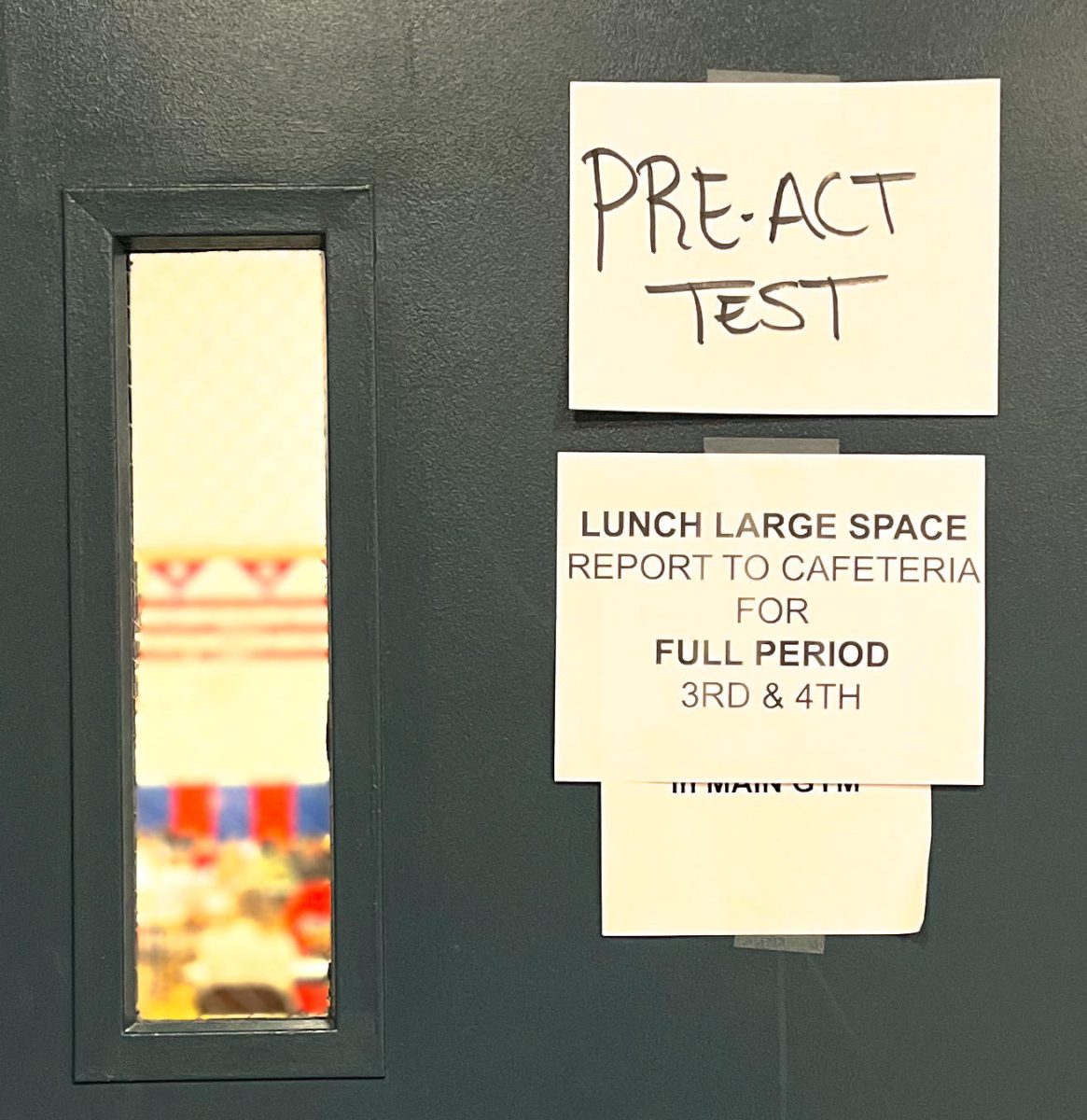 The main gym door of TWHS warns against entry while students take the pre-ACT on the morning of November 13, 2024.