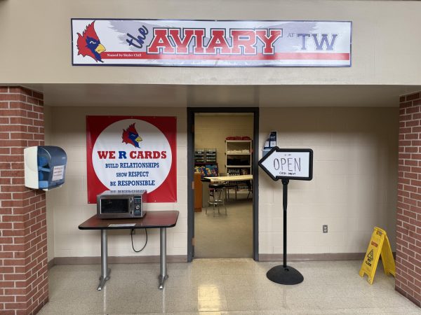 The current location of The Aviary, inside the cafeteria. It will be relocated upon the completion of the second half of the building. The sign will also be updated once construction is complete.