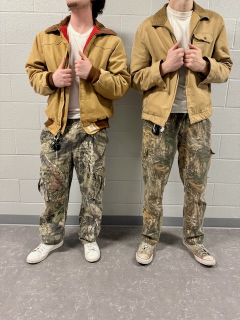 Twins for the win. Trendy camo cargo pants and a relaxed fit Beige jacket.