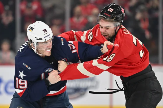 USA's Matthew Tkachuk's fight with Brandon Hagel in the first USA-Canada game.