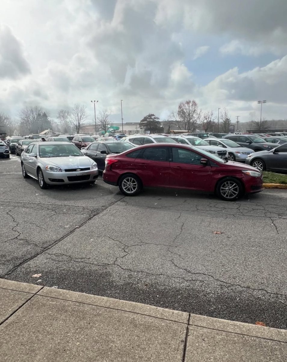 The parking lot at TWHS filled with student vehicles. 