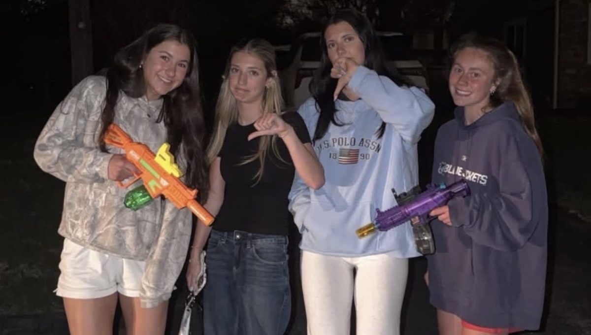 Mila, Sydney, Ella, and Haley (c/o '26) pose for a photo after a Senior Tag battle. All competion must be documented to determine fairness. 